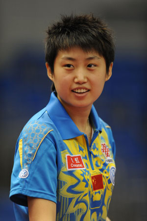 China's Guo Yue smiles during the training ahead of the 50th world table tennis championships in Yokohama, Japan, April 27, 2009. The April 28-May 5 championships at Yokohama Arena will feature men's and women's singles, men's and women's doubles and mixed doubles. 