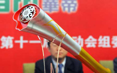 Photo taken on April 28, 2009 shows the torch named 'Ruyi' for China's 11th National Games in Jinan, capital of east China's Shandong Province.