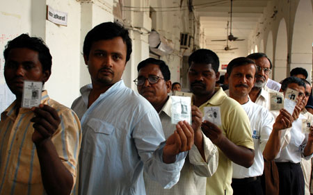 India held the third phase of its general elections Thursday in a relatively peaceful atmosphere with an estimated 50 percent turnout, lower that the previous two phases of polling, said Indian election commission officials.