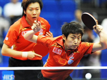 Chinese player Guo Yue(R) returns the ball during the women's doubles semifinal match against Jiang Huajun/Tie Yana of Chinese Hong Kong at the World Table Tennis Championships in Yokohama, Japan, on May 4, 2009. Guo Yue/Li Xiaoxia won the match 4-0 and advanced into the final. [Xinhua]