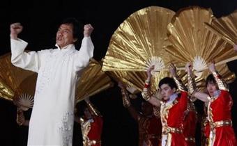 Chinese movie star Jackie Chan, left, performs during a concert held at the Bird Nest Stadium in Beijing, Friday, May 1 , 2009. [Ng Han Guan/AP Photo] 