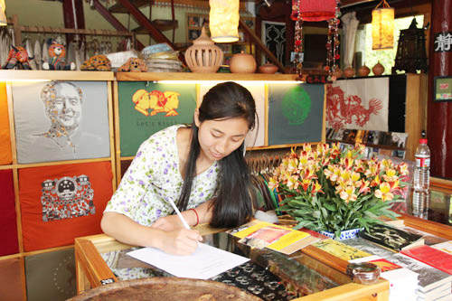 The owner of a small store, answering our Happiness Survey. [Photo: CRIENGLISH.com]