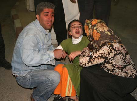 A child cries near the site of a wedding attack at the Bilge village near the city of Mardin, southeast Turkey, May 4, 2009. At least 44 people were killed and 17 others were wounded in a brutal armed attack on a wedding party in southeast Turkey on Monday, hospital officials said. (Xinhua/Anadolu)