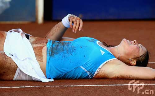 Dinara Safina of Russia lays on the ground after falling heavily during her second round match against Virginie Razzano of France during day two of Rome Masters tennis tournament on May 5, 2009 in Rome, Italy.