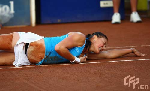 Dinara Safina of Russia lays on the ground after falling heavily during her second round match against Virginie Razzano of France during day two of Rome Masters tennis tournament on May 5, 2009 in Rome, Italy.