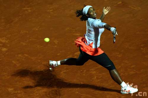 Serena Williams of the USA hits a backhand during her second round match against Patty Schnyder of Switzerland during day two of Rome Masters tennis tournament at Foro Italico on May 5, 2009 in Rome, Italy.