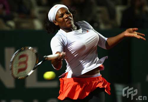  Serena Williams of the USA hits a forehand during her second round match against Patty Schnyder of Switzerland during day two of Rome Masters tennis tournament at Foro Italico on May 5, 2009 in Rome, Italy.