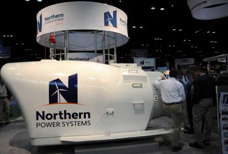 Visitors look at a 2.5 MW wind turbine of the Northern Power Systems during the Wind Power 2009 Conference and Exhibition in Chicago, Illinois, the United States, May 5, 2009. The Wind Power 2009 Conference and Exhibition, taking place from May 4 to 7, featurs the lastest industry development and technologies of wind energy professionals from the U.S., Germany, Norway, Korea, China and so forth. (Xinhua/Hu Guangyao)