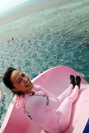 "The Best Job in the World" competition finalist Magali Heuberger of the Netherlands laughs after snorkelling near Hamilton Island, about 950km (590 miles) north of Brisbane, May 4, 2009. Heuberger is one of 16 finalists from 15 nations in the tourism promotion competition aimed at attracting visitors to Australia