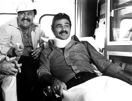 Actors Dom DeLuise (L) and Burt Reynolds are shown in a scene from their 1981 film 'The Canonball Run'.
