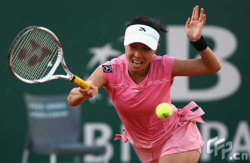 Zheng Jie of China hits a forehand during her third round match against Dinara Safina of Russia during day three of the Sony Ericsson WTA Tour Internazionli BNL D'Italia event at Foro Italico on May 6, 2009 in Rome, Italy. 