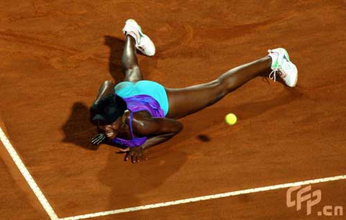 Venus Williams of the USA slides along the clay after diving for a shot during her match against Anna Chakvetadze of Russia during day three of the Sony Ericsson WTA Tour Internazionli BNL D'Italia event at Foro Italico on May 6, 2009 in Rome, Italy.