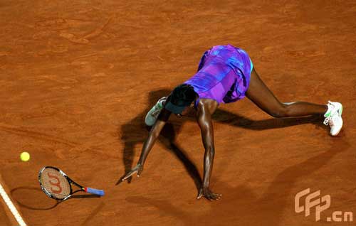Venus Williams of the USA slides along the clay after diving for a shot during her match against Anna Chakvetadze of Russia during day three of the Sony Ericsson WTA Tour Internazionli BNL D'Italia event at Foro Italico on May 6, 2009 in Rome, Italy.