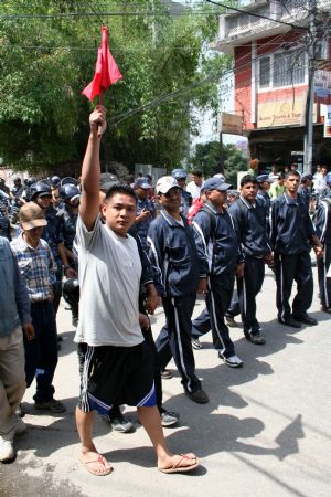 Communist Party of Nepal (Maoist) supporters attend a rally against the Nepalese president in Kathmandu, capital of Nepal, May 6, 2009. Protestors were on the streets of the capital after resignation of Prime Minister Prachanda.