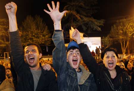Protestors shout during a rally in Tbilisi, May 6, 2009. Police and protesters clashed in Georgia on Wednesday during a month-long opposition campaign to oust President Mikheil Saakashvili, stoking fears of unrest after a failed military mutiny.