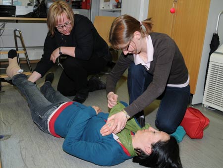 A member of Finnish Red Cross offers first aid training in Helsinki, Finland, May 5, 2009. May 8 is the World Red Cross Day. Finnish Red Cross held a 6-day campaign that started on Monday to publicize the organization and recruit volunteers.