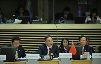 Chinese Vice Premier Wang Qishan (C), Chinese Minister of Commerce Chen Deming (L) and Minister of Finance Xie Xuren attend the Second China-European Union High Level Economic and Trade Dialog at the EU headquarters in Brussels, capital of Belgium, May 7, 2009. [Wu Wei/Xinhua]
