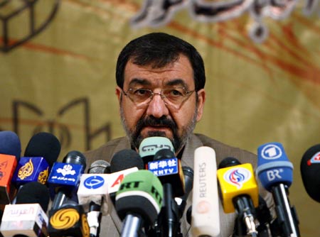 Iran&apos;s former Commander of the Islamic Revolution Guards Corps (IRGC) Mohsen Rezaei speaks to the media after registering his candidacy for the presidential election in Tehran, capital of Iran, May 8, 2009. Rezaei formally registered his candidacy on Friday for the June 12 presidential election. (Xinhua/Liang Youchang)