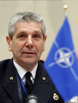 Chairman of the NATO Military Committee Admiral Giampaolo Di Paola delivers a speech at the start of a NATO Chiefs of Defence meeting at the Alliance headquarters in Brussels May 6, 2009.