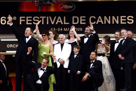 Creators and their family memebers of the 3D animated movie 'Up' pose during the screening of their movie on the opening night of the 62nd International Film Festival in Cannes, France, May 13, 2009.[Xinhua]