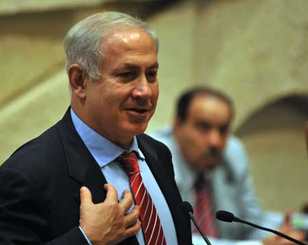 Israeli Prime Minister Benjamin Netanyahu speaks at a special Knesset session marking the 64th anniversary of the victory over Nazi Germany in Jerusalem, May 13, 2009. [Yin Bogu/Xinhua]