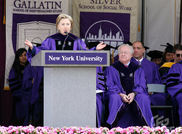 Secretary of State Hillary Rodham Clinton addresses students after receiving an honorary Doctor of Law degree during New York University's graduation ceremony held at Yankee Stadium on May 13, 2009 in New York. [CFP]