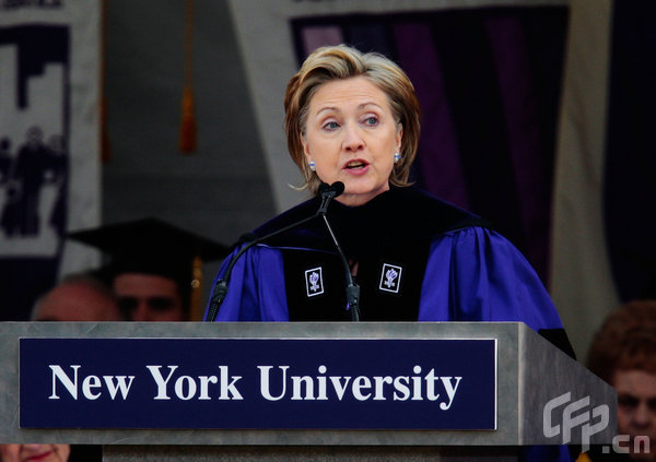 U.S. Secretary of State Hillary Rodham Clinton speaks at the 177th commencement exercises for New York University (NYU) at Yankee Stadium May 13, 2009 in the Bronx borough of New York City. Clinton recieved an honorary degree and addressed the graduates about public service and their future in a changing world.[CFP]