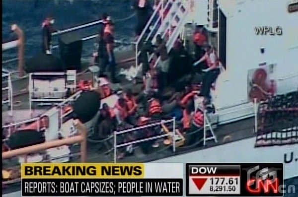 At least nine people have died after a boat capsized 10 miles off Florida's east coast. The vessel, carrying 28 people believed to be Haitan immigrants, overturned at 2am on Wednesday (may 13). A major search and rescue mission was launched and a number of survivors have been plucked from the ocean. The passengers are believed to have been in the water for over 10 hours before the first rescue was made, at 12.40pm the following day.[CFP]