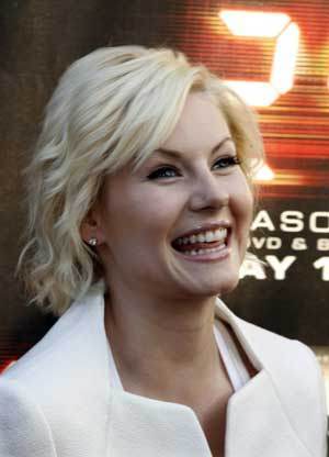 Cast member of '24' Elisha Cuthbert poses at a screening of the season finale of Fox television drama series '24' season seven in Los Angeles,California May 12, 2009. [Xinhua/Reuters]