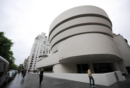 An exterior view of Solomon R.Guggenheim Museum is seen along Fifth Avenue in New York, the U.S. on May 14, 2009. Fifty years after the realization of Frank Lloyd Wright's renowned design, the Guggenheim Museum kicks off its one-year golden anniversary celebration of its landmark building with the opening exhibition of its designer Frank Lloyd Wright: From Within Outward. On view from May 15 through August 23, 2009, the 50th anniversary exhibition brings together 64 projects desinged by one of the most influential architects of the 20th century, with more than 200 of his drawings. (Xinhua/Gu Xinrong)