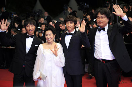 South Korean director Bong Joon-Ho (R1), actress Kim Hye-Ja (L2), Won Bin (R2) and Jin Goo arrive for the screening of director Ang Lee