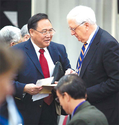 Xiong Guangkai with J. Stapleton Roy, former US ambassador to China, at an international forum, China's Peaceful Development and Harmonious World, in Beijing in November, 2007. 
