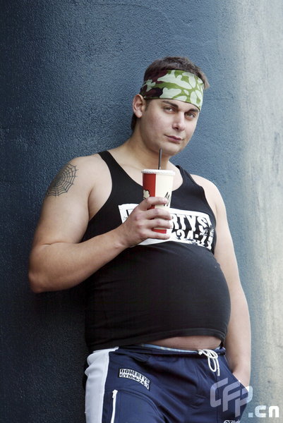 Paul 'PJ' James enjoys a milkshake after going over his desired weight of 120Kg and now weighs 124Kg.[CFP] 