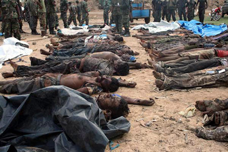  This photograph released by the Sri Lankan military on May 19, 2009 shows what the army says are the bodies of Liberation Tigers of Tamil Eelam (LTTE) soldiers they killed recently. The army also released video footage May 19 showing what the claim is the body of the Tamil Tiger leader Vellupillai Prabhakaran. [China Daily/Agencies]