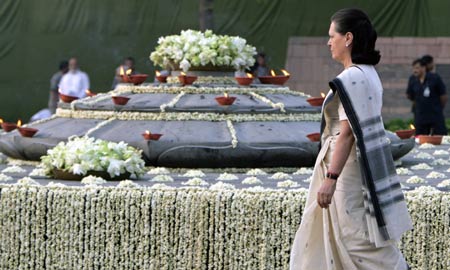 Chief of India's Congress party Sonia Gandhi walks after paying tribute at her husband and former prime minister Rajiv Gandhi's memorial on the occasion of the former prime minister's 18th death anniversary in New Delhi May 21, 2009. Rajiv Gandhi was killed by a female suicide bomber during election campaigning on May 21, 1991.[Xinhua/Reuters]