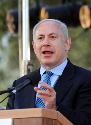 Israeli Prime Minister Benjamin Netanyahu speaks at a state ceremony marking the Jerusalem Day, which celebrates the conquest of East Jerusalem during the 1967 Six Day War, in east Jerusalem, May 21, 2009. [Yin Bogu/Xinhua]