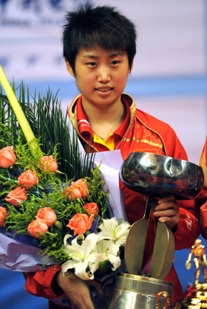 China's Guo Yue reacts during the awarding ceremony for the final of women's singles at the 22nd Asian Cup table tennis tournament in Hangzhou, capital of east China's Zhejiang Province, May 21, 2009. Guo Yue claimed the title by winning over her compatriot Liu Shiwen 4-0.(Xinhua/Xu Yu)