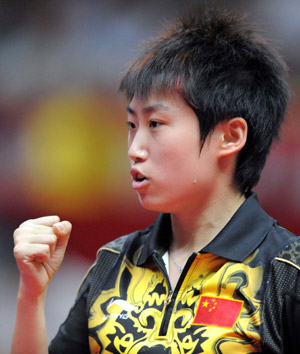 China's Guo Yue reacts after scoring against her compatriot Liu Shiwen during the final of women's singles at the 22nd Asian Cup table tennis tournament in Hangzhou, capital of east China's Zhejiang Province, May 21, 2009. (Xinhua/Xu Yu)