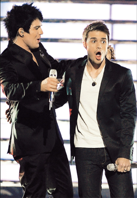 Kris Allen (right) reacts with surprise after beating rollicking vocal powerhouse Adam Lambert (left) for the 'American Idol' title on Wednesday night in the United States. Allen's smooth vocals and boy-next-door image gave him the edge after nearly 100 million viewer votes were cast, turning the theatrical Lambert into the most unlikely of also-rans. 