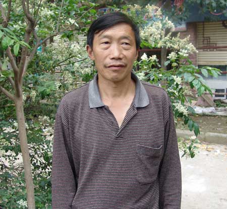 Barefoot teacher Wang Yanshou was dismissed from his teaching post by Beichuan County government, Sichuan, after 23 years service. 