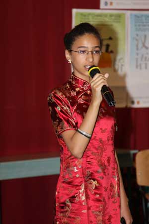 A competitor whose Chinese name is Xinqing delivers a speech during the preliminary Budapest round of this year's 'Chinese Bridge', a Chinese-language proficiency competition for foreign high school students, in Budapest, capital of Hungary, May 22, 2009. Xinqing won the runner-up of this round. The winner of the preliminary Budapest round Liu Anguo and two runner-ups will attend the semi-finals in central China's Chongqing Municipality in October this year. 