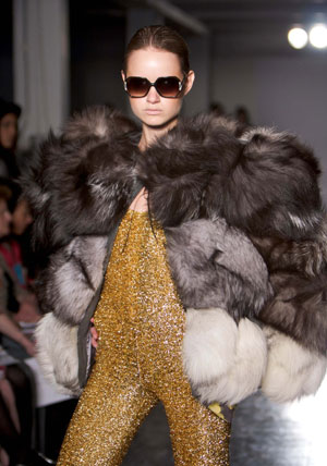 Students present their fashion creations designed for graduation during a degree show held at the Central Saint Martins College of Art and Design in London, May 21, 2009. 