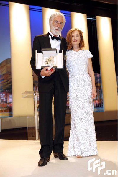 Director Michael Haneke winner of the Palm D'Or for 'The White Ribbon' and French jury president Isabelle Huppert during the closing ceremony at the 62nd International Film Festival in Cannes, France on May 24, 2009.