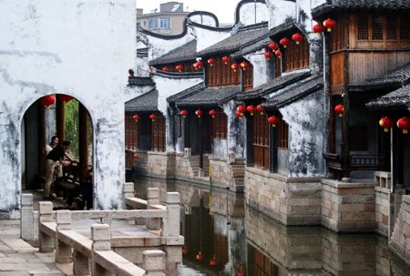 The street is decorated with red lanterns in Jiaxing, east China's Zhejiang Province, May 24, 2009, to celebrate the Chinese traditional Duanwu Festival which falls on May 28 this year. A culture festival with the theme of Duanwu folk custom will be held here from May 26 to 30 in the city. 