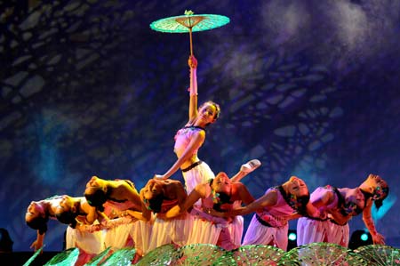 Some students from a middle school for the blind and hearing-impaired children rehearse on the stage in the Art Performance Center in Liuzhou City of southwest China's Guangxi Zhuang Autonomous Region, on the early morning of May 25, 2009. Dozens of physically disabled artists had a rehearsal against time in the Art Performance Center for the coming 7th Guangxi Joint Performing Art Festival for the Disabled. 