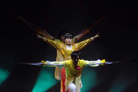 Some handicapped artists rehearse on the stage in the Art Performance Center in Liuzhou City of southwest China's Guangxi Zhuang Autonomous Region, on the early morning of May 25, 2009. Dozens of physically disabled artists had a rehearsal against time in the Art Performance Center for the coming 7th Guangxi Joint Performing Art Festival for the Disabled. 