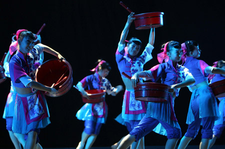 Dancers from Zhangjiagang Culture Center perform a dance creation named 