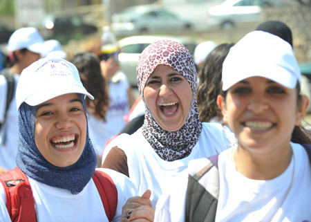 Jewish and Arab women participate in a march in Shfaram, northern Israel, May 26, 2009. Thousands of Jewish and Arab women took part in the march for unity, rights and partnership here on Tuesday. (Xinhua/Yin Bogu)