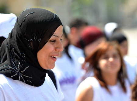 Jewish and Arab women participate in a march in Shfaram, northern Israel, May 26, 2009. Thousands of Jewish and Arab women took part in the march for unity, rights and partnership here on Tuesday. (Xinhua/Yin Bogu)