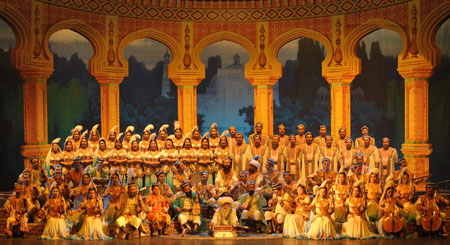 Actors perform the Uyghur Muqam in Urumqi, capital of northwest China's Xinjiang Uygur Autonomous Region, May 27, 2009. Xinjiang Uyghur Muqam is a mixture of song, dance, folk performing art and classical music. (Xinhua/Zhao Ge)